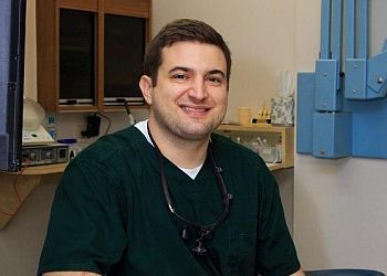 Photo of ADAM MARTIK, CONDITIONS TREATED: TMJ Appliances TREATMENTS OFFERED: General Dentistry, Implant Restoration, Dentures, CEREC, Periodontal Treatment, Porcelain Veneers, Root Canals, Tooth Extraction, Tooth-Colored Fillings, Crowns, Bridges, Bonding, Hygiene, Veneers, Kor Teeth Whitening in PITTSBURGH