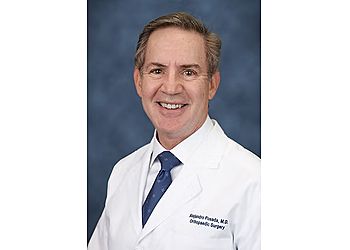 Photo of ALEJANDRO POSADA, CONDITIONS TREATED: Rotator Cuff Tendinitis, Bursitis, Shoulder Labrum, Meniscus Tears, Lateral Epicondylitis (Tennis Elbow), Hamstring and Quadriceps Strains, Knee Ligament Injuries (ACL, PCL, MCL), Ankle Sprains, Instability &amp; Arthritis
TREATMENTS OFFERED: Elbow Arthroscopy, Joint Replacement Surgery, Shoulder and Knee Arthroscopy &amp; Injections in MIAMI