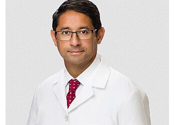 Photo of ASHUTOSH PRADHAN, TREATMENTS OFFERED:Minimally Invasive Spine Surgery, Cervical and Lumbar Arthoplasty, Brain Tumors, Anterior Cervical Discectomy and Fusion, Telehealth, Artificial Discs of Cervical and Lumbar Spine, Deformity, Minimally Invasive and Complex Spinal Disorders, Spinal Disc, Scoliosis, Herniated Discs, Brain &amp; Nervous System in JACKSONVILLE