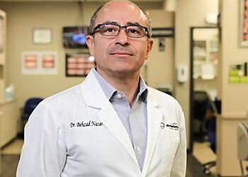 Photo of BEHZAD NAZARI, CONDITIONS TREATED: TMJ Disorder, Tooth-Colored Fillings, Children’s Dental Health, Periodontal Issues, Tooth Discoloration, Dental Decay and Misaligned Teeth TREATMENTS OFFERED: Porcelain Veneers, Oral Surgery, Inlays/Onlays, Cosmetic Dentistry, Invisalign, Orthodontic Treatments, Full and Partial Dentures, Dental Crowns, Teeth Whitening, Dental Sealants, General Dentistry Services, Full Mouth Restoration, Periodontal Treatments, Hybrid Dental Implants, Dental Bridges &amp; Root Canals in HOUSTON