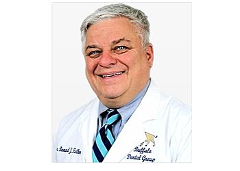 Photo of BERNARD J. KOLBER, CONDITIONS TREATED: Gum Disease, TMJ and Oral Cancer
TREATMENTS OFFERED: Preventive and Restorative Dentistry, Invisalign, Orthodontics, Teeth Whitening, Dentures, Partials, Implants, Onlays, Porcelain Veneers, Gum Contouring, Bonding, Shaping, Sealants, Checkups, Exams, Cleanings, Periodontal Therapy, Crowns, Clear Braces &amp; Tooth Extractions in BUFFALO