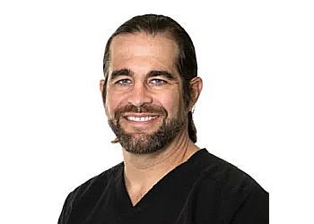 Photo of BLAIR TUDOR, TREATMENTS OFFERED:Prosthodontics, Sedation, Invisalign®, Cosmetic Dentistry, Preventative Care, Emergency Dentistry, Periodontics, Root Canals, Extractions &amp; TMJ Treatment in ANCHORAGE