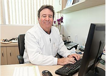 Photo of BRAD J. KANE, CONDITIONS TREATED: Tooth Discoloration and Gum Disease
TREATMENTS OFFERED: Smile Makeovers, Teeth Whitening, Bonding, Implants, Bridges, Fillings, Crowns, Inlays, Onlays, Veneers, Dental Exams, Laser Dentistry, Deep Cleanings, Clear Braces, Dentures, Oral Hygiene, Sealants, Cosmetic Dentistry, Wisdom Tooth Removal, Root Canal &amp; Arestin in OXNARD