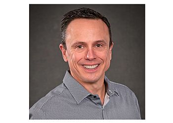 Photo of BRAD STOVIE, CONDITIONS TREATED:Gum Disease, Cavity and Broken Tooth TREATMENTS OFFERED:Cleaning and Checkup, Cosmetic Dentistry, Tooth Replacement, Whitening, Sedation Dentistry, Teeth Straightening &amp; Invisalign® Treatment in CEDAR RAPIDS