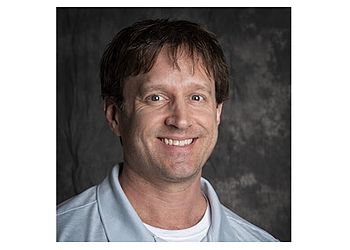 Photo of BRENT RISING, TREATMENTS OFFERED:Fillings, Pedodontics, Wisdom Teeth, Dental Exams and Cleanings, Digital X-Rays, Dental Implants, Crowns and Bridges, Dentures, Root Canal Therapy, ClearCorrect™, Invisalign®, Six Month Smiles®, Kids Dentistry &amp; In-Office Whitening in OMAHA