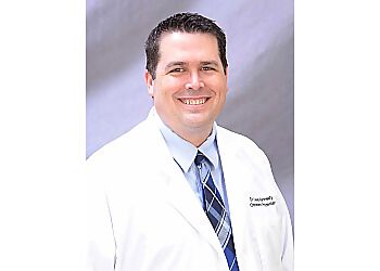 Photo of CALEB KENNEDY, CONDITIONS TREATED:Hyperopia (Farsightedness), Myopia (Nearsightedness), Presbyopia, Conjunctivitis, Contact Lenses, Trauma, Macular Degeneration, Cataracts, Astigmatism, Diabetic Eye Disease, Low Vision, Red Eyes, Glaucoma, Sunglasses, Ortho K, Pediatric Vision Care, Ocular Disease &amp; Retinal Trauma

Glaucoma Surgery, Diabetic Eye Exam, Glaucoma Screening, Emergency Eye Care, Contact Lens Exams, Eye &amp; Vision Exams, Lasik Co-management, Diabetic Retinopathy, Cataract Co-management, Visual Rehabilitation &amp; Eye Disease Management in PEMBROKE PINES