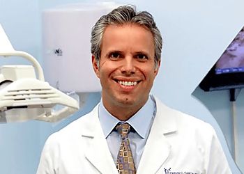 Photo of CARLOS C. GARCIA, CONDITIONS TREATED: TMJ and Sleep Apnea
TREATMENTS OFFERED: Teeth Whitening, Bonding, Tooth-Colored Fillings, Inlays, Onlays, Crowns, Cosmetic Dentistry, Periodontal Maintenance, Porcelain Veneers, Dental Implants, Invisalign Clear Braces, Root Canals, Bridges, Extractions, Dentures &amp; Sedation in GLENDALE