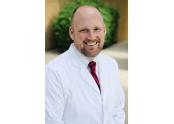 Photo of CHASE D. DAVIS, CONDITIONS TREATED: Wisdom Teeth, Toothache, Knocked Out Tooth and Chipped Tooth TREATMENTS OFFERED: Extractions, Invisalign, Root Canals, Family/Cosmetic Dentistry, Cerec, Crowns, Bridges, Implants, Dentures, Teeth Cleaning, Prevention and Whitening &amp; Filling in CHANDLER