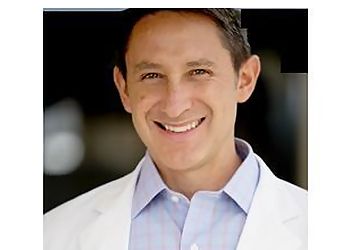 Photo of CHRISTIAN M. DICKSON, CONDITIONS TREATED: Peripheral Neuropathy, Hammer Toe, Heel Spur, Neuroma, Metatarsal and Bunion TREATMENTS OFFERED: Electronic Pulse Therapy, Orthotics, Casting, Diabetic Foot Care, Foot and Ankle Surgery, Sports Medicine, Bunion Surgery, Nail Surgery, Reconstructive Surgery &amp; Postoperative Care in CORPUS CHRISTI