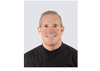 Photo of CHRISTOPHER K. MILLER, CONDITIONS TREATED: Wisdom Teeth and Emergency Services TREATMENTS OFFERED: Tooth-Colored Fillings, Porcelain Veneers, Tooth Extraction, Sealants, Crowns, Bridges, Implants, Root Canals, Dentures, Partial Dentures, Teeth Whitening, Invisalign Clear Braces, Restorations, Cosmetic Bonding, CEREC, Bone Grafting &amp; Cosmetic Dentistry in COLUMBUS