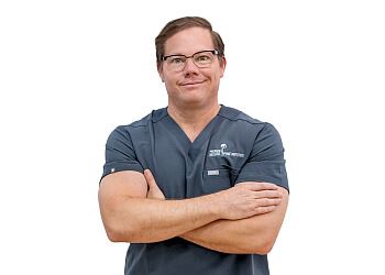 Photo of CHRISTOPHER KOEBBE, CONDITIONS TREATED:Spine, Spinal Stenosis, Spondylolisthesis, Herniated and Bulging Disc, Radiculopathy, Myelopathy, Osteoarthritis, Adhesive Arachnoiditis, Failed Back Syndrome, Scoliosis, Spinal Fractures, Degenerative Disc Disease, Facet Joint Dysfunction, SI Joint Dysfunction, Brain Tumors, Meningioma, Hydrocephalus, Vascular Malformations, Brain Aneurysm/Stroke, Trigeminal Neuralgia, Cerebral Hemorrhage &amp; Traumatic Brain Injury/Concussion in ST PETERSBURG