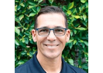 Photo of CLINT, TREATMENTS OFFERED:Acute Injury Rehabilitation, Alter G Treadmill, Blood Flow Restriction (BFR), Chronic Injury Rehabilitation, Cupping, Ehlers-Danlos Syndrome, Ergonomic Assessments, FAST Recovery Zone, FAST® Personal Training, Functional Movement Screening (FMS), Gait and Running Analysis, Geriatric Therapy, Golf Performance, Graston Technique and Instrument-Assisted Soft Tissue Mobilization (IASTM), Hand Therapy, Kinesio Taping, Parkinson’s LSVT BIG® Program, Pediatric Therapy, Pelvic Floor Therapy, Performing Arts Physical Therapy, Physical Therapy for Knee Pain, Post-Covid Rehab, POTS and Postural Orthostatic Tachycardia Syndrome, Pre- and Post-Surgical Rehabilitation, Rapid Recovery® Injury Assessment &amp; Senior After-Care Program in SURPRISE