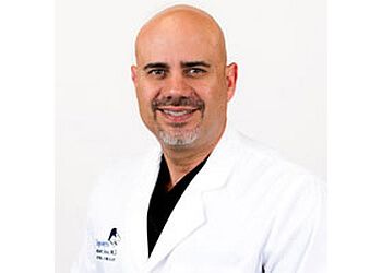 Photo of DAGOBERTO GONZALEZ, CONDITIONS TREATED: Laparoscopic Hysterectomy, Pelvic Prolapse, Infertility, Stress Urinary Incontinence, Heavy Periods, Birth Control, High Risk and Normal Pregnancy, 3D and 4D Ultrasounds, Annual Exam, Irregular Bleeding, Pelvic Pain, STD Screening/HPV Testing, Fibroids/Cyst, Vaginal Infections &amp; Hormone Replacement TherapyTREATMENTS OFFERED: Laparoscopic Hysterectomy &amp; Hormone Replacement Therapy in LAREDO