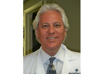 Photo of DALE MONAST, CONDITIONS TREATED:Hammertoes, Calluses, Sports Injuries Treatments, Heel Pain, Laser Treatment for Toenail Fungus, Corns, Clubfoot, Bunions, Ingrown Toenails, Shockwave Therapy for Heel Pain, Neuromas &amp; Diabetic Foot Care in CLEARWATER