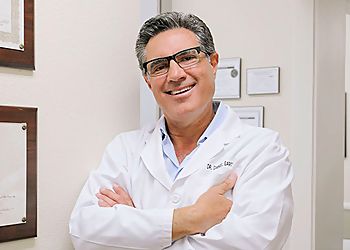 Photo of DANIEL GARCIA, CONDITIONS TREATED: Teeth Grinding, Clenching and Gum Treatment TREATMENTS OFFERED: Cosmetic Dentistry, Crowns and Bridges, Dental Implants, Fillings, Dentures, Veneers, Teeth Whitening, Extractions, Invisalign &amp; Root Canal in DOWNEY