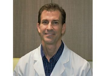 Photo of DARREN ELENBURG, CONDITIONS TREATED: Achilles Tendon, Advanced Diagnostics, Ankle Pain, Ankle Sprains, Athlete&#x27;s Foot, Bunions, Corns, Diabetic Foot Care, Diabetic Shoes, Flat Feet, Foot and Ankle Fractures, Foot Orthotics, Foot Pain, Hammertoes, Heel Pain, Heel Spurs, Ingrown Toenails, Neuroma (Morton&#x27;s), Neuropathy, Peripheral Arterial Disease (PAD), Plantar Fasciitis, Plantar Warts, Sports Medicine, Toenail and Skin Problems, Toenail Fungus, Vaporox System, Vascular Diagnostics, Wound Care.TREATMENTS OFFERED: Diabetic Foot Care, EPAT Shockwave Therapy, Minimally Invasive Bunion Surgery, Foot and Ankle Surgery, 3D Bunion Correction Surgery, &amp; Wound Care in OKLAHOMA CITY