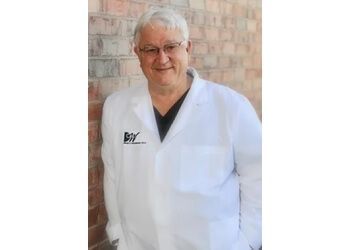 Photo of DAVID C. WOODBURN, CONDITIONS TREATED: Family and Cosmetic Dentistry TREATMENTS OFFERED: Teeth Whitening, Implants, Restorations, Veneers, Exams, Preventive Care, Tooth-Colored Fillings, Sealants, Dentures, Crowns, Bridges, Tooth Extractions &amp; Root Canal Therapy in AMARILLO