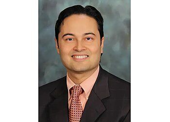 Photo of DEBORSHI ROY, CONDITIONS TREATED: 
Balance Disorders, Ringing in Ears, Deviated Septum, Adenoids and Adenoiditis, Allergies, Dizziness, Earaches, Nose Bleed, Post Nasal Drip, Hearing Loss, Meniere’s Disease, Facial Fractures, Laryngitis or Hoarseness, Sinusitis, Smell and Taste Disorders, Snoring &amp; Sore Throats in RANCHO CUCAMONGA