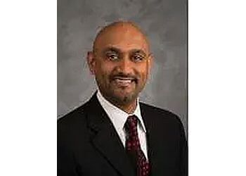 Photo of DHARMESH DAN BHAKTA, CONDITIONS TREATED:Foot and Ankle Pain, Bunions, Heel Pain, Plantar Fasciitis, Diabetic Wound Care, Flat Feet, Neuromas, Children’s Foot Care, Hammertoes, Achilles Tendon, Sports Injuries, Ingrown Toenails, Ankle Sprain, Peripheral Nerve Disease, Fracture, or Acute Problems, Chronic Non-Healing Wounds, Diabetic (Charcot) Foot &amp; Flat Foot in ARLINGTON