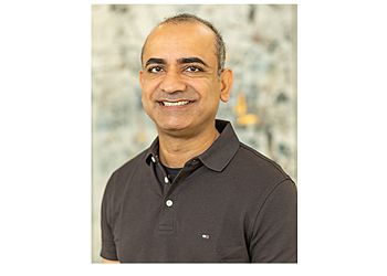 Photo of DHIREN AHIR, TREATMENTS OFFERED:Checkup and Cleaning, Cavity or Broken Tooth, Gum Disease, Periodontal Therapy, Restorative Dentistry, Crowns and Bridges, Dentures and Partials, Dental Implants, Cosmetic Dentistry, Porcelain Veneers, Metal-Free Crowns, Invisalign® Clear Braces &amp; Emergency Dentistry in DENTON