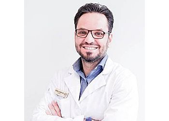 Photo of DR. ABDUL RAHMAN AYACH, CONDITIONS TREATED: Emergency Care and TMJ TREATMENTS OFFERED: Dental Fillings, Sealants, Preventive Dentistry, Exams and Cleanings, Extractions, Fluoride Treatment, Oral Cancer Screenings, Root Canal Therapy, Sedation, Wisdom Tooth Extraction, Invisalign, Orthodontics, Teeth Whitening, Veneers, Dental Implants, Crowns, Bridges &amp; Bonding in AJAX