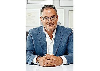 Photo of DR. ADI YOSKOVITCH, CONDITIONS TREATED: Ear Infections, Swimmer&#x27;s Ear, Fluid in the Ears, Ear Pain, Hearing Loss, Vertigo and Dizziness, Tinnitus, Chronic Runny Nose, Chronic Nasal Congestion, Smell Loss, Nosebleeds (Epistaxis), Tonsillitis, Tonsils, Bad Breath, Hoarse Voice and Voice Changes, Salivary Gland Stones, Sleep Apnea, Chronic Cough and Clearing and Bruxism
TREATMENTS OFFERED: Hearing Aid Assessment, Ear Cleaning, Earlobe Repair, Smell Loss Assessment, Septal Gap Management, Turbinate Reduction Surgery, Thyroid Nodule Biopsy &amp; Cervical Mass Biopsy in LAVAL