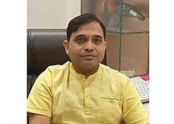 Photo of DR. AJAY SHUKLA, Hearing Loss, Labyrinthitis, Tinnitus, Mastoiditis, Sensorineural Hearing Loss, Cholesteatoma, Conductive Hearing Loss, Vertigo, Vestibular Schwannoma, Dizziness, Noise-Induced Hearing Loss, Otomycosis, Presbycusis, Abscess, Acute and Chronic Sinusitis, Rhinitis, Allergy, Nasal Polyp, Nosebleed, Nasal Congestion, Hay Fever, Common Cold, Rhinorrhea, Nasal Septum Deviation, Head and Neck Cancer, Foreign Body, Choanal Atresia, Chronic Atrophic Rhinitis, Influenza, Granuloma, Upper Respiratory Tract Infection, Snoring, Nasopharynx Cancer, Cleft Lip and Cleft Palate, Anosmia, Nasal Septum Perforation, Cutaneous Condition, Nose Neoplasms, Pharyngitis, Laryngeal Cancer, Salivary Gland Diseases and Disorders &amp; Thyroid in ALLAHABAD