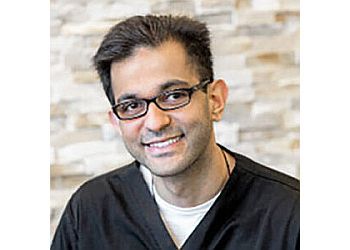 Photo of DR. ASAD HASAN, CONDITIONS TREATED:Sleep Apnea, TMJ, Tooth Sensitivity and Wisdom Teeth Pain TREATMENTS OFFERED:Composite Fillings, Dental Bonding, Dental Bridges, Dental Crowns, Dental Extractions, Dental Implants, Dentures, Root Canal, Teeth Cleanings, Dental Veneers, Invisalign, Orthodontics, Teeth Whitening, Child’s First Appointment, Fluoride Treatment, Orthodontics for Teens, Pediatric Treatment &amp; Education, Oral Cancer Screening, Sedation &amp; Sports Guards in AJAX
