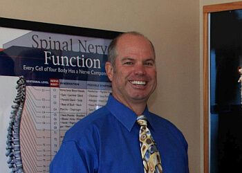Photo of DR. BRAD ROBINSON, CONDITIONS TREATED: 
Chronic Childhood Illness, Spinal Conditions (e.g., Herniated Discs, Degenerative Disc Disease, Slipped Discs), Sciatica, Fibromyalgia, TMJ (Temporomandibular Joint Disorder), Carpal Tunnel Syndrome, Migraine Headaches, Neck and Shoulder Pain, Lower Back Pain, Knee Pain and Poor Posture
TREATMENTS OFFERED: Spinal Decompression Traction Therapy, Spinal Postural Screenings, Webster Technique, Natural Chiropractic Care, Nutritional Counseling &amp; Prenatal Chiropractic Care in NORFOLK