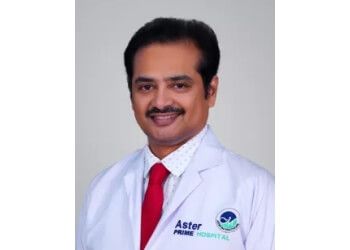 Photo of DR. B.S.V.RAJU, Brain Conditions, Brain Tumours, Pituitary Tumours, Trigeminal Neuralgia, Cranial Surgery, Neuronavigation, Neuroendoscopy, Spine Conditions, Lumbar Disc Herniation, Cervical Disc Herniation, Lumbar Canal Stenosis, Sciatica, Lumbar Spondylolisthesis, Chiari Malformation, Spine Treatments, Minimally Invasive Spine Surgery, Cervical Spine Surgery, Anterior Cervical Discectomy, Cervical Spine Fusion Surgery, Cervical Disc Replacement Surgery, Thoracic Spine Surgery, Lumbar Spine Surgery, Anterior Lumbar Spine Fusion Surgery, Posterior Lumbar Fusion Surgery, Lumbar Disc Replacement Surgery, Miscellaneous, Radio-frequency Ablation of Trigeminal Nerve, Spinal Nerve Blocks, Epidural Nerve Blocks, Sacroiliac Joint Blocks &amp; RF Facetal Ablation in HYDERABAD