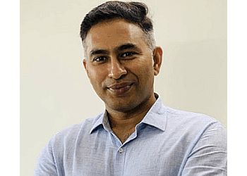 Photo of DR. C. VASUDEV, Abdominal Pain, Loose Motions, Alteration in Transaminases Levels, Difficulty in Swallowing, Painful Swallowing, Excessive Burping/Belching, Hiccoughs, Pain in the Rectum/Anal Area, Blood in Stools, Constipation, Jaundice, Abdominal Bloating, Iron Deficiency Anemia, Chest Pain, Excessive Flatulence &amp; Acid Reflux in NAVI MUMBAI