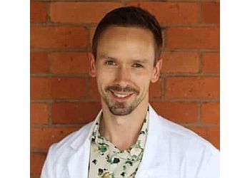 Photo of DR. CHRISTOPHER SIMS, CONDITIONS TREATED:
Gum Recession, Lip and Tongue Tie
TREATMENTS OFFERED:
Nightguard, Free Second Opinions, Invisalign, Dental Implants, Wisdom Teeth Extractions, Smile Makeovers, Veneers, IV Sedation, Root Canals, White Fillings, Gum Recession Treatments, Laughing Gas, Bridges, All Types of Dentures, Children&#x27;s Dentistry, Lip and Tongue Tie Releases, Laser Gum Treatments, Botox &amp; Digital X-Rays in HAMILTON