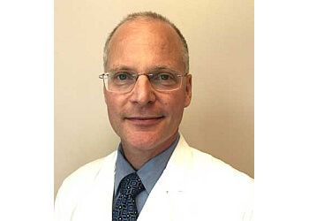 Photo of DR. CRAIG HEINLY, CONDITIONS TREATED:
Skin Cancers, Moles, Birthmarks, Warts, Other Growths, Psoriasis, Eczema, Acne, Rashes, Hair &amp; Nail Problems in DURHAM