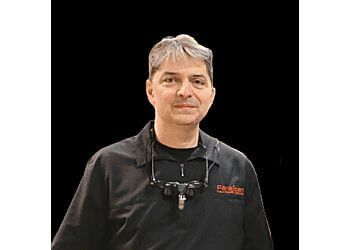 Photo of DR. CRISTIAN PARASCAN, CONDITIONS TREATED: Preventive Care TREATMENTS OFFERED: Laser Decay Removal, Smile Reconstruction, Restoration, Gum Treatments, Root Canal Treatments, Crowns, Bridges &amp; Veneers in SAINT JOHN