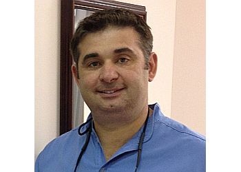 Photo of DR. DAN FORESTO, CONDITIONS TREATED: Gum Disease and Dental Emergencies TREATMENTS OFFERED: Teeth Whitening, White Fillings, Veneers, Cosmetic Dentistry, Family Dentist, Root Canal Treatment, Invisalign, Implants, Dentures &amp; Preventive in WINDSOR