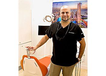Photo of DR. DANIAL DEHESHI, CONDITIONS TREATED: Wisdom Tooth Problems and Soft Tissue Issues
TREATMENTS OFFERED: General and Cosmetic Dentistry, Cleanings, Invisalign, Composite Fillings, Teeth Whitening, Porcelain Veneers, Crowns, Wisdom Tooth Removal, Implants, Oral and IV Sedation, Check-Up, Tooth Extractions, Root Canals, Soft Tissue Management &amp; Polishings in BURNABY