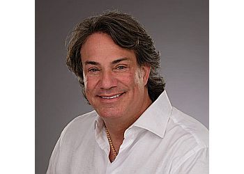 Photo of DR. DAVID MADY, CONDITIONS TREATED: Emergency and Pediatric Care  TREATMENTS OFFERED: Cosmetic Services, Bridges, Crowns, Root Canal and Wisdom Teeth, Dental Implants, Invisalign, Bleaching, Tooth-Colored Fillings, Odontoplasty, Full Mouth Restoration, Porcelain and Composite Inlays, Veneers &amp; Teeth Whitening in WINDSOR