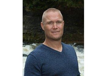 Photo of DR. DEAN MACDONALD, CONDITIONS TREATED:Foot, Knee, Shoulder, Lower Back and Neck Pain, Arthritis, Fibromyalgia, Whiplash, Headaches, Disc Injuries, Pinched Nerves, Scoliosis, Sports Hernia, Carpal Tunnel Syndrome, Degenerative Disc Disease and SciaticaTREATMENTS OFFERED:Spinal Adjustment &amp; Acute Spinal Care in GUELPH