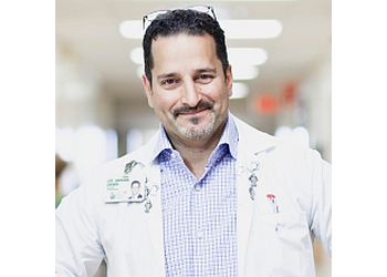 Photo of DR. DENIS SIRHAN, CONDITIONS TREATED:Cavernous Malformations, Cerebral Aneurysms and Avm&#x27;s, Trigeminal (and Other) Neuralgias Requiring Microvascular Decompression, Normal-Pressure Hydrocephalus, Skullbase and Pituitary Tumors Including Schwannomas, Meningiomas, Chordomas &amp; Other Malignancies in MONTREAL