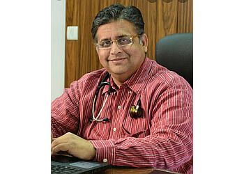 Photo of DR. DEVANG MAHESHCHANDRA DESAI, Cardiology Consultation, Heart Diseases, ECHO, TMT, Abdominal Aortic Aneurysm, Angina Pectoris, Ambulatory BP Monitoring, Arrhythmia, Cardiomyopathy, Atherosclerosis, Myocardial Infarction, Hypertension, ECG, Heart Failure &amp; Coronary Artery Disease in SURAT