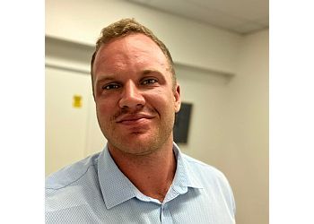 Photo of DR. DYLAN MOLTONI, Chiropractic Treatments, Knee and Neck Pain, Headaches, Low Back and Ankle Pain, Shoulder Pain &amp; Sciatica in TANNUM SANDS