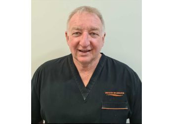 Photo of DR EUGENE “BLUE” CLARK, Wisdom Teeth Removal, Preventive, Tmj Dysfunctions, Muscle Tightness, Oral and Systemic Conditions, Implants, Oral Cancers, Aesthetic Surgery, Invisalign, Clear Braces, Crowns, Veneers, Cleaning, Teeth Whitening, Root Canal, Scaling, Fluoride Treatment &amp; Cleaning in BUNBURY