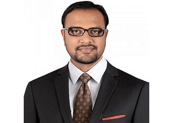 Photo of DR. GAUTAM MAKADIA, Chemotherapy of Solid Tumors, Lung Cancer Treatment, Oral Cancer Treatment, Melanoma Treatment, Stem Cell Transplantation, Sinonasal Malignancies Treatment, Giant Cell Tumor Treatment &amp; Vulvar Cancer Surgery in RAJKOT