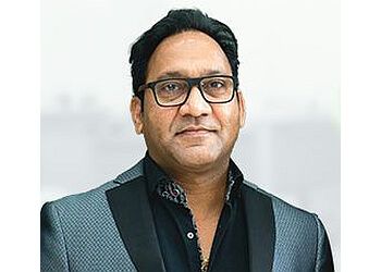 Photo of DR. GIRIDHAR PONNAM, CONDITIONS TREATED: Periodontal/Gum Disease and Emergency Dental Care TREATMENTS OFFERED: Dental Bonding, Dental Implants, Orthodontics, Root Canal Treatment, Crowns, Tooth-Coloured Fillings, Dentures, Porcelain Veneers, Invisalign &amp; Teeth Whitening in BRAMPTON