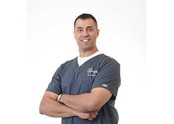 Photo of DR. GURINDER CHAHAL, CONDITIONS TREATED: TMJ/TMD and Gum Disease TREATMENTS OFFERED: Crowns and Bridges, Mercury Free (Composite) Fillings, Root Canal Treatment, Dental Sealants, Complete and Partial Dentures, Sports Mouth Guards and Night Guards, Teeth Whitening, Dental Implants, Porcelain Veneers, Porcelain Inlays/Onlays, Dental Bonding &amp; Gum Contouring in PORT COQUITLAM