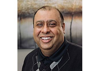 Photo of DR. HARMINDER KHAMBAY, CONDITIONS TREATED: Dental EmergenciesTREATMENTS OFFERED: Deep Teeth Cleaning, Dental Filling, Extractions, Invisalign, Veneers, Implants &amp; Dentures in GUELPH