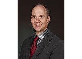 Photo of DR. IAN RUSSELL, CONDITIONS TREATED:
Arch Pain, Heel Pain, Balls of Feet Pain, Warts, Sports Injuries, Ankle Sprains, Bunions, Flat Feet, Hammertoes, Fungus (Fungal Infections), Plantar Fasciitis, Neuromas, Diabetic Foot Care, Achilles Tendon Issues, Calluses, Heel Spurs, Foot Injuries, Ankle Instability, Metatarsalgia, Corns and Calluses
TREATMENTS OFFERED:
Ingrown Nail Treatment, Conservative Care, Surgical Interventions, Sports Injury Management, Fungal Infection Treatments, Orthotic Prescriptions, Diabetic Foot Care Protocols, Callus and Corn Removal, Heel Spur Management &amp; Neuroma Treatments in CALGARY