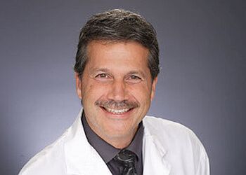 Photo of DR. JOHN TOMC - REVITALIZE MEDICAL LASER CENTRE, Gynecologists specialist
