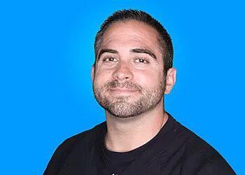 Photo of DR. JUSTIN GOMEZ, CONDITIONS TREATED:  Back, Foot, Hip, Knee, Low Back, Neck, Chronic and Shoulder Pain, Muscle Spasms, Headaches, Accident and Injury Care, Ankle, Migraines, Sciatica, TMD, Car Accidents, Sports and Work Injury, Tennis, Golfers Elbow &amp; Whiplash in CHANDLER