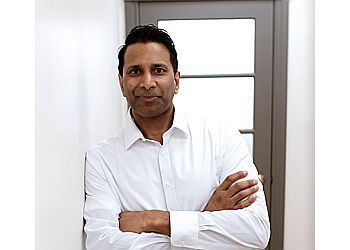 Photo of DR. K. APPALRAJU, TREATMENTS OFFERED: Family Dentistry, Sedation, Dental Emergencies, Cosmetic Dentistry, Digital Oral Health Scan, Dental Implants, Invisalign &amp; Hygiene Therapy in RED DEER